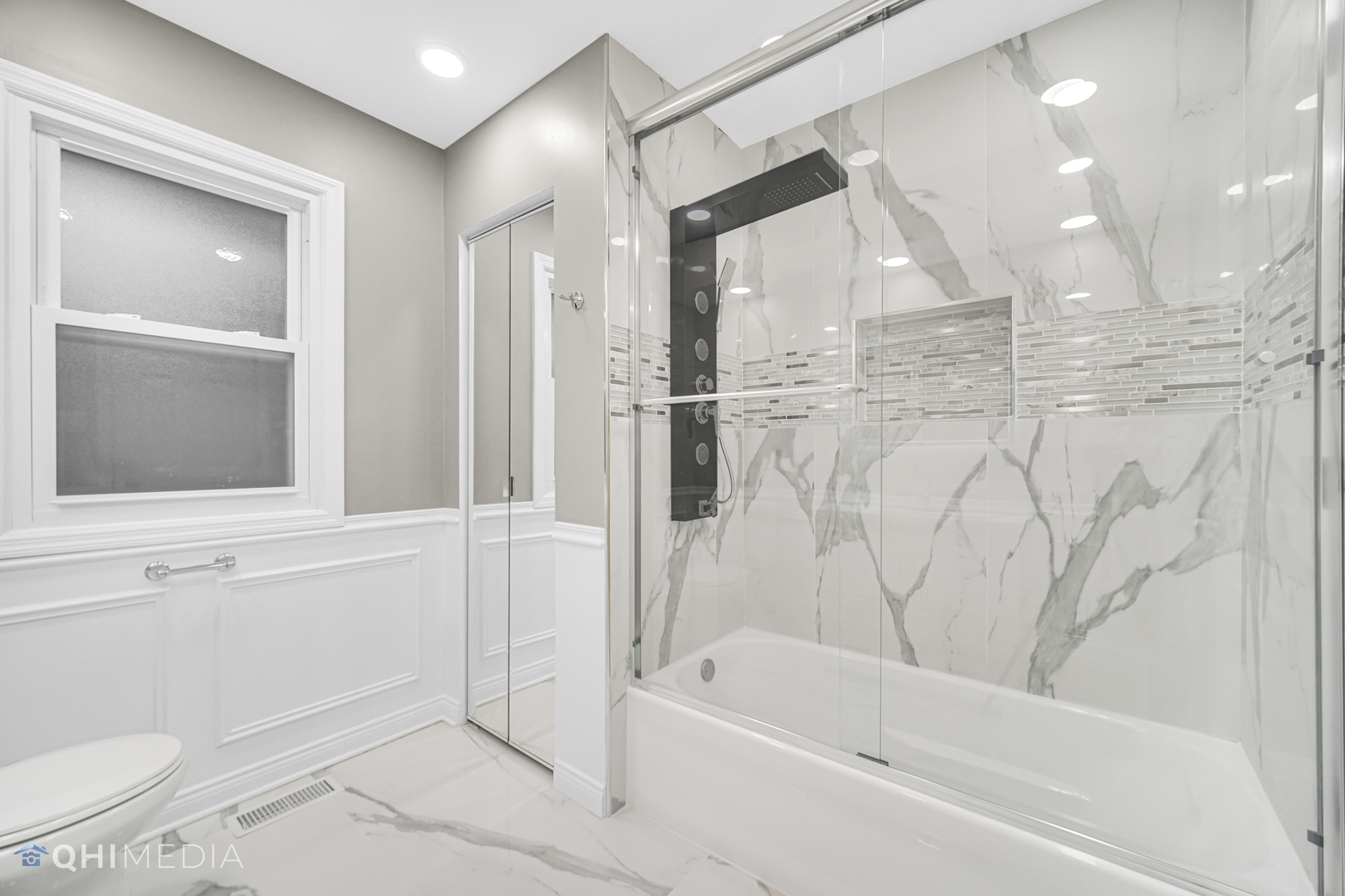 Undisclosed Address Olympia Fields, IL 60461 - Photo 33 of 38 a bathroom with a bathtub and a shower