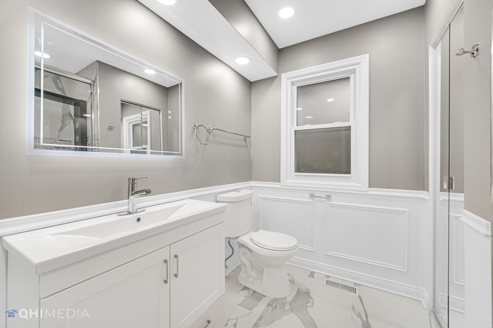 Undisclosed Address Olympia Fields, IL 60461 - Photo 34 of 38 a bathroom with a sink a toilet and bathtub