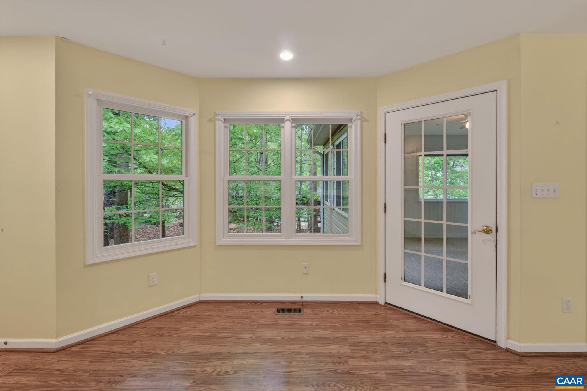 37 Laguna Road Palmyra, VA 22963 - Photo 19 of 44 an empty room with wooden floor and windows