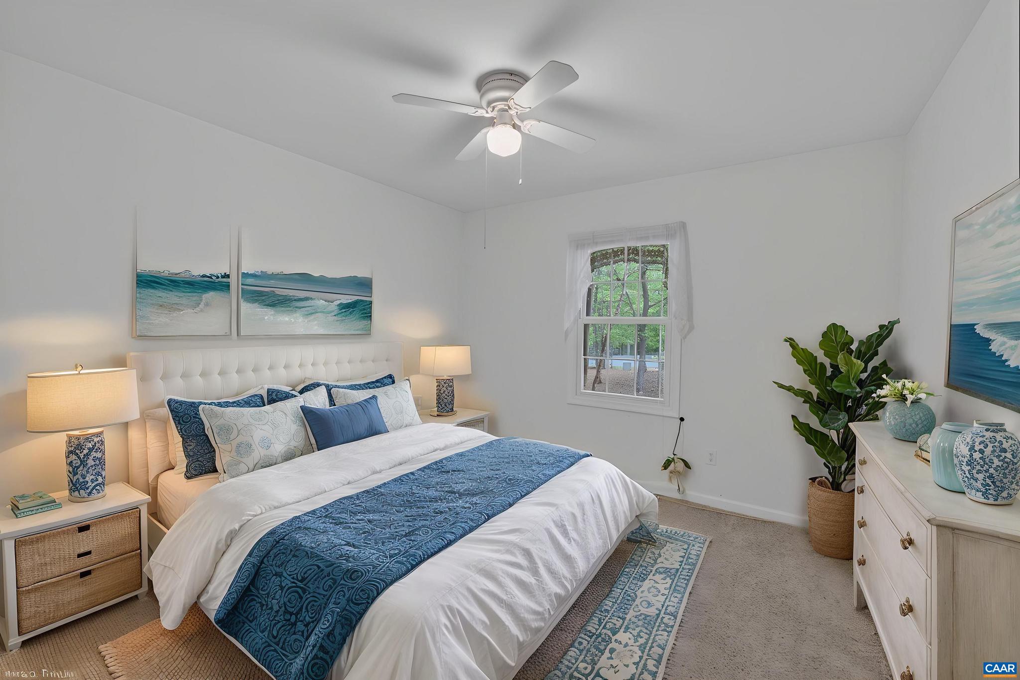 37 Laguna Road Palmyra, VA 22963 - Photo 34 of 44 a bedroom with a bed and a potted plant