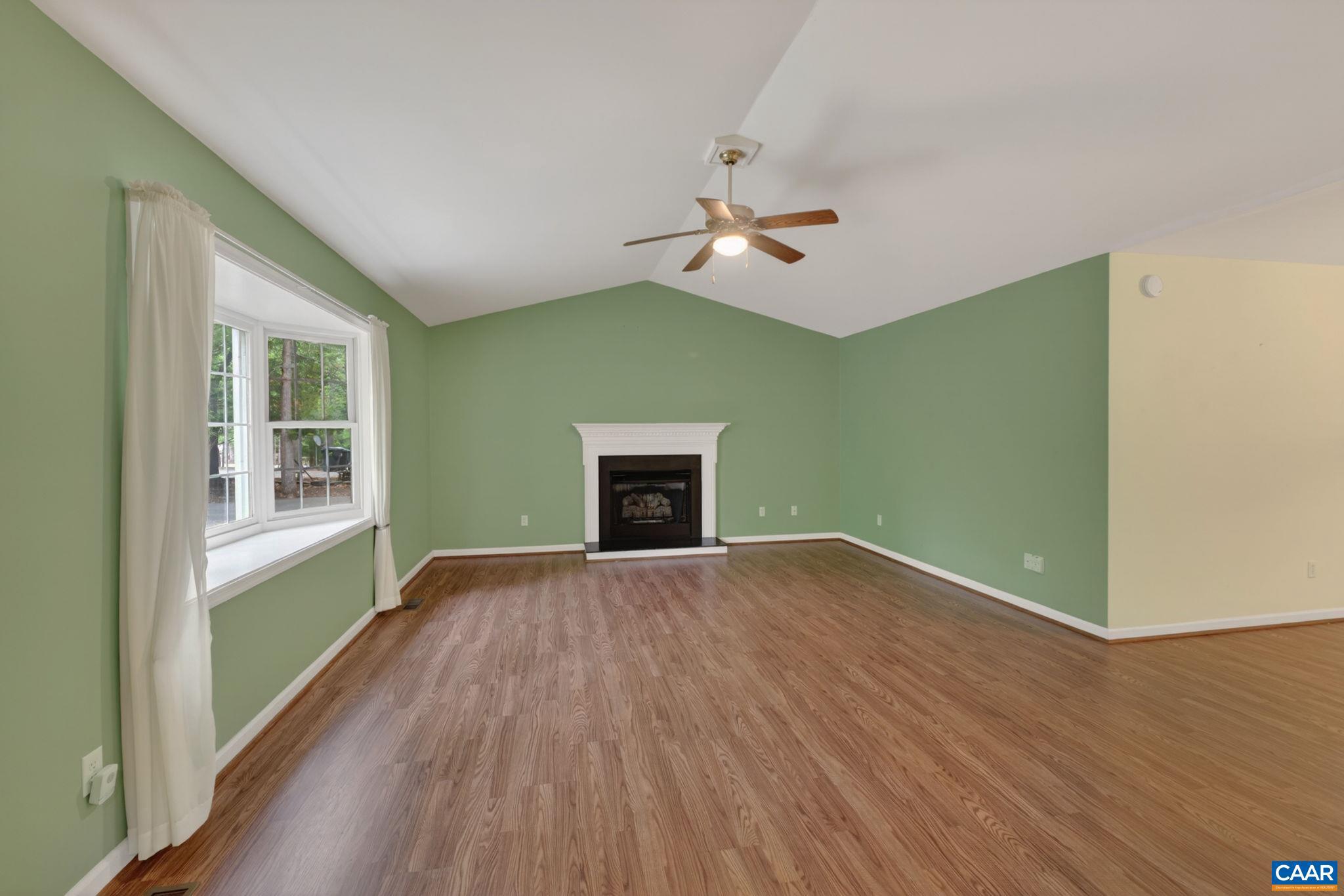 37 Laguna Road Palmyra, VA 22963 - Photo 7 of 44 a view of empty room with wooden floor and fan