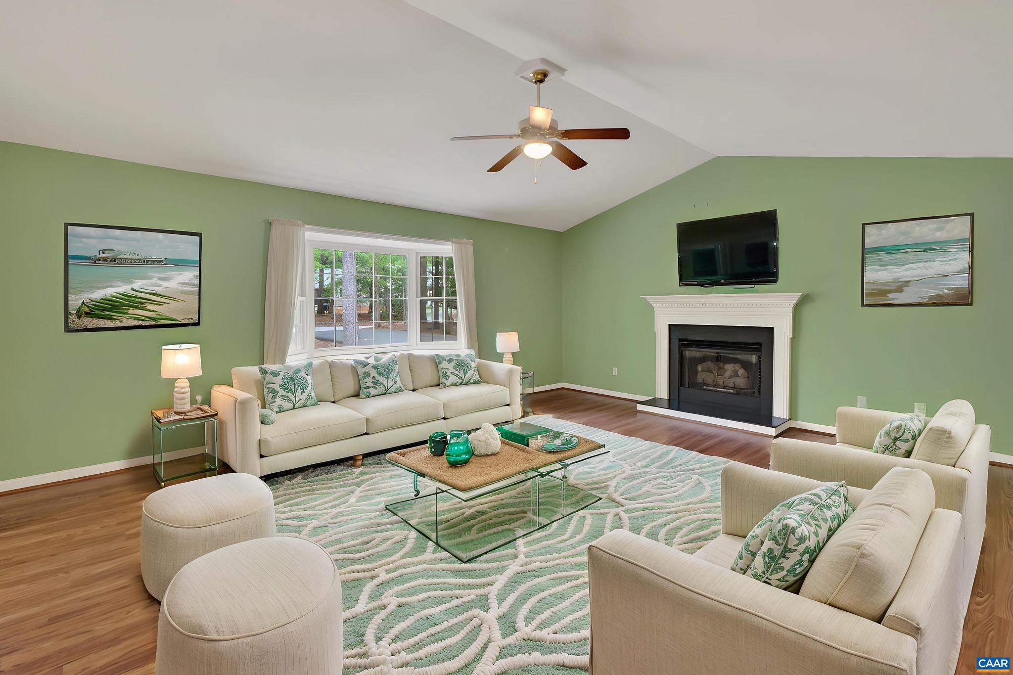37 Laguna Road Palmyra, VA 22963 - Photo 8 of 44 a living room with furniture and a fireplace