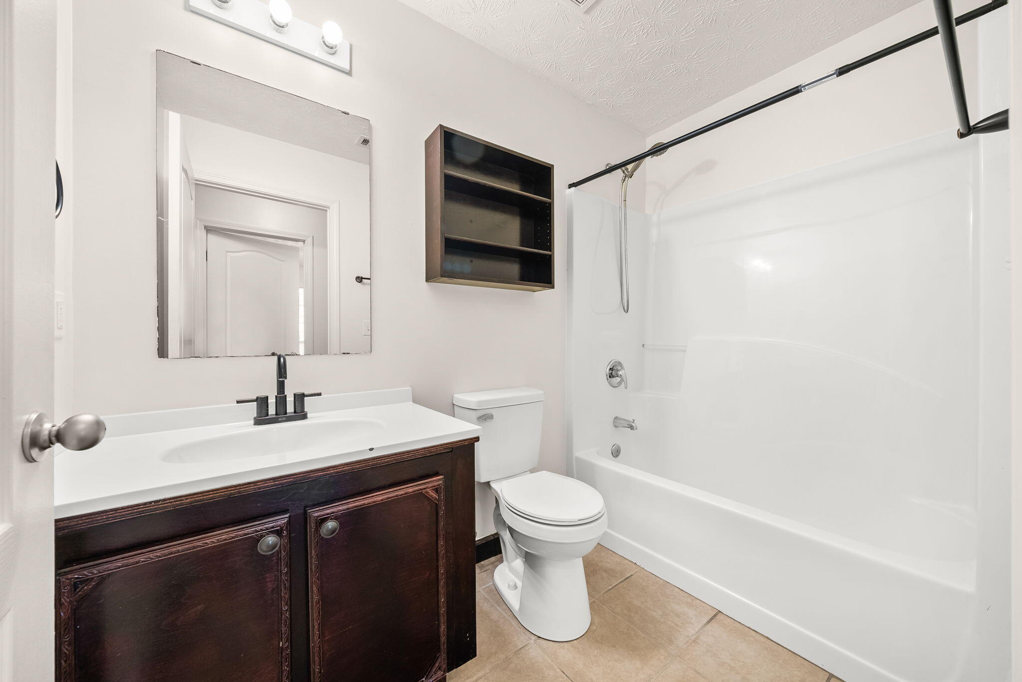 88 Tropical Way Freeport, FL 32439 - Photo 17 of 31 a bathroom with a sink a toilet and shower