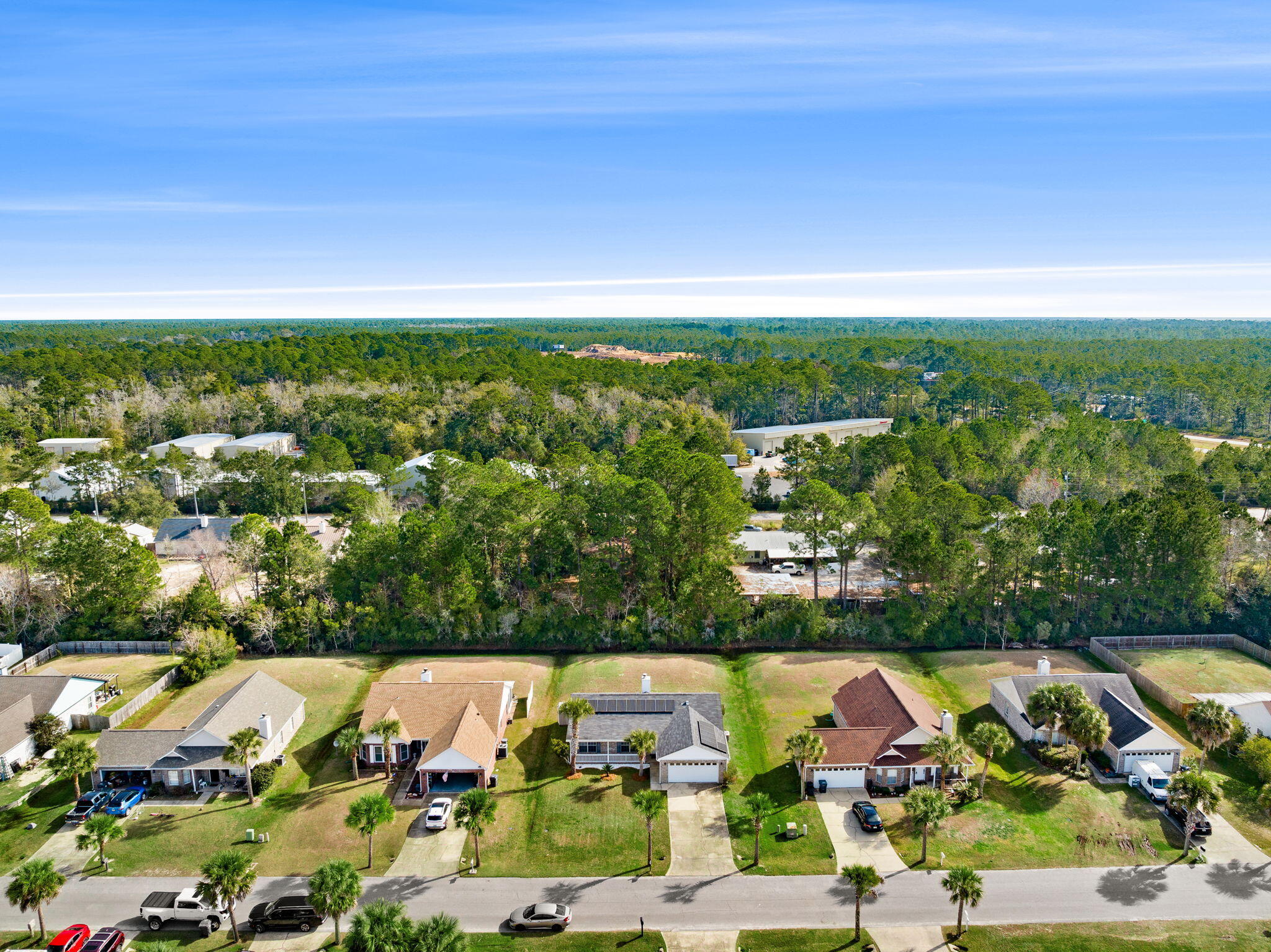 88 Tropical Way Freeport, FL 32439 - Photo 26 of 31 an aerial view of residential houses with outdoor space and street view