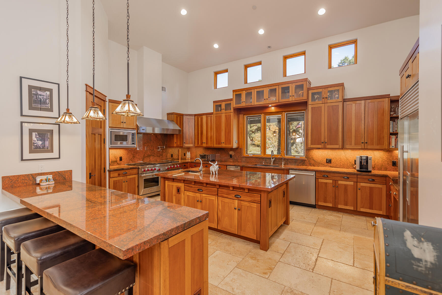 705 South Rice Road Ojai, CA 93023 - Photo 13 of 61 a kitchen with stainless steel appliances granite countertop a sink and cabinets