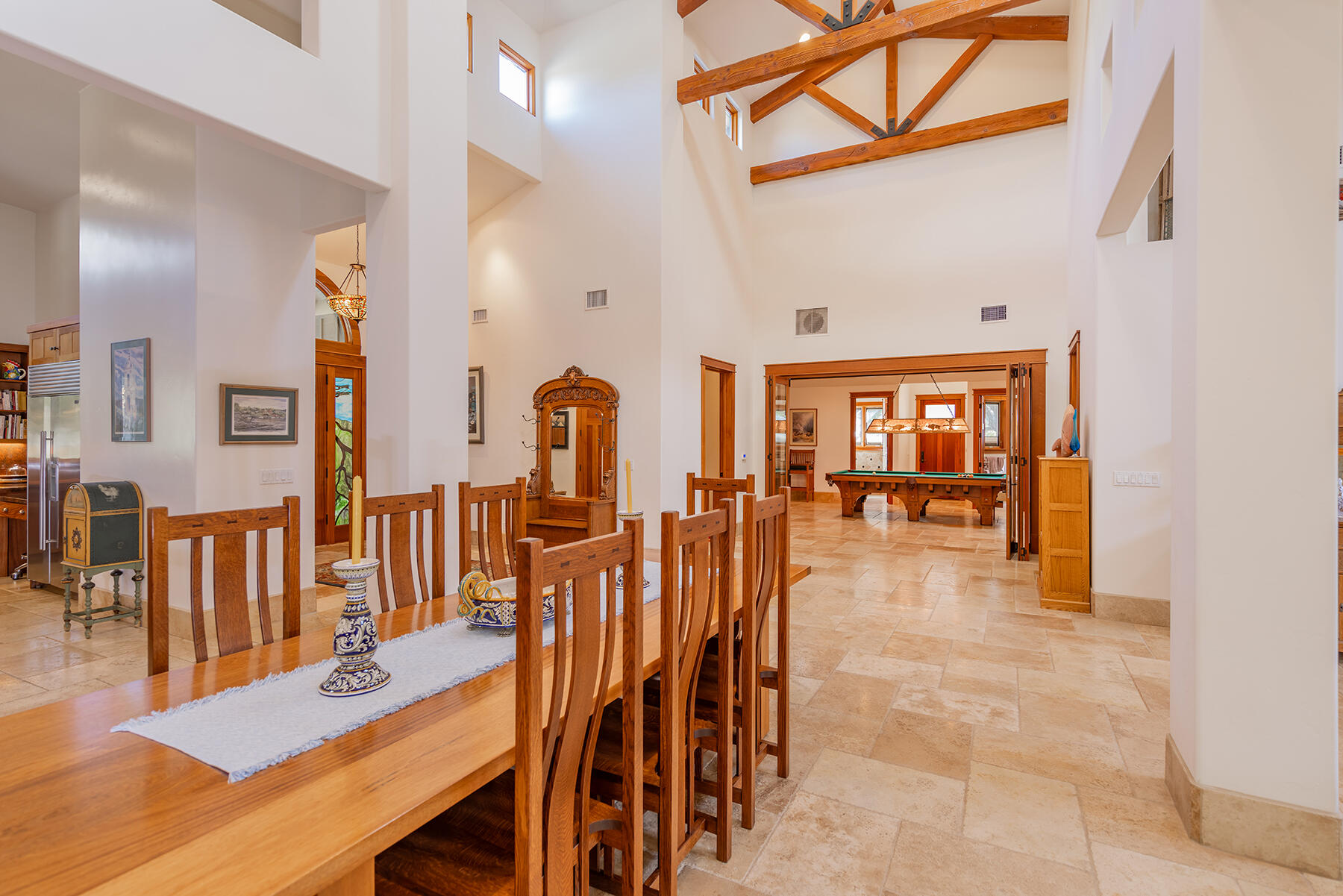 705 South Rice Road Ojai, CA 93023 - Photo 16 of 61 a dining room with furniture and wooden floor