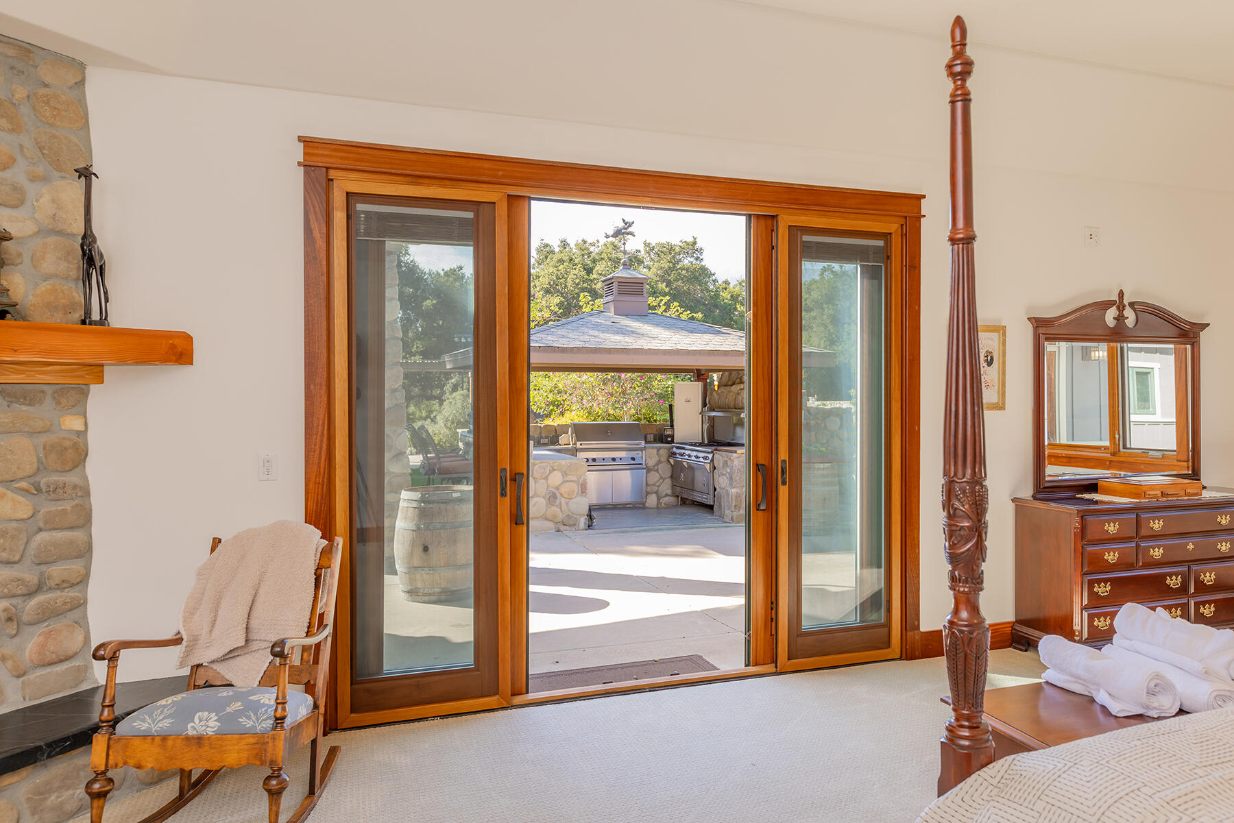 705 South Rice Road Ojai, CA 93023 - Photo 22 of 61 a living room filled with furniture and a floor to ceiling window
