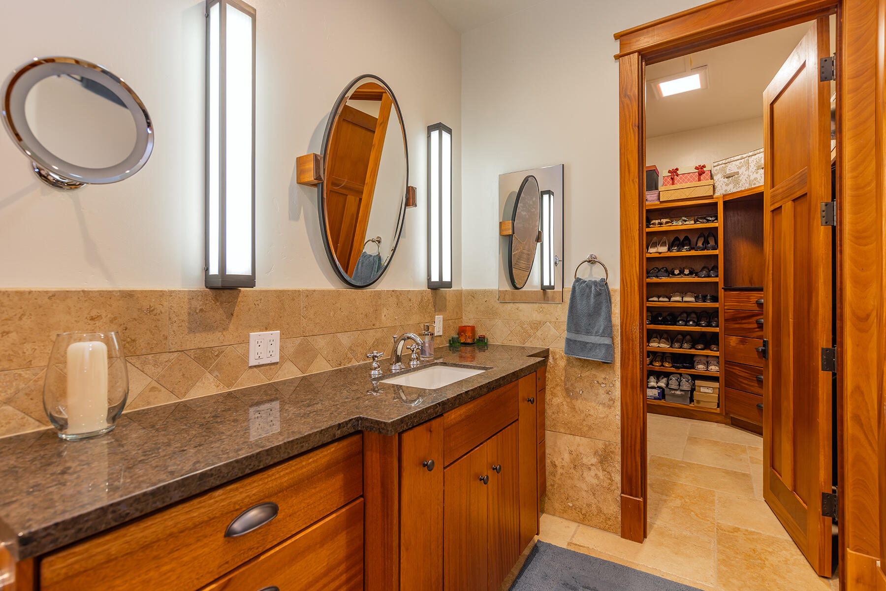 705 South Rice Road Ojai, CA 93023 - Photo 23 of 61 a bathroom with a sink and a mirror
