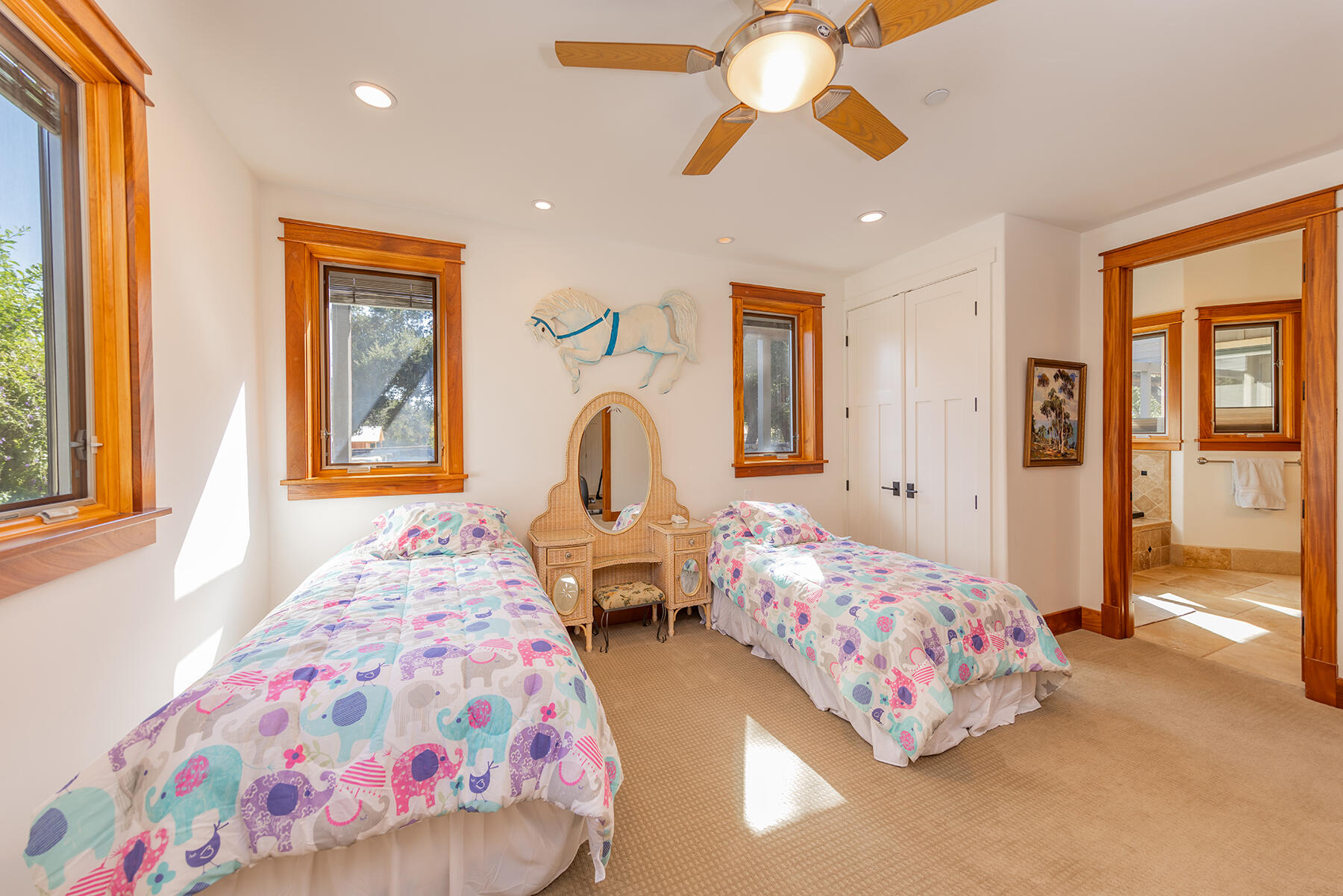 705 South Rice Road Ojai, CA 93023 - Photo 24 of 61 a bedroom with two beds and a chandelier