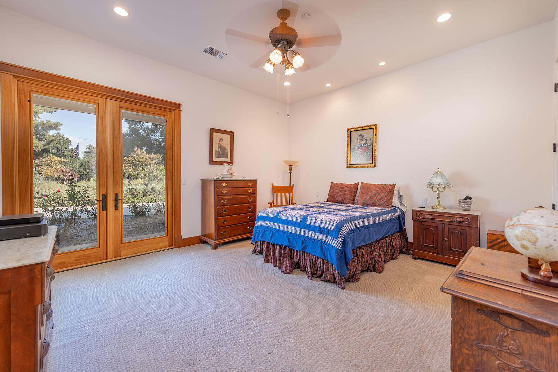 705 South Rice Road Ojai, CA 93023 - Photo 27 of 61 a room with a bed and a chandelier