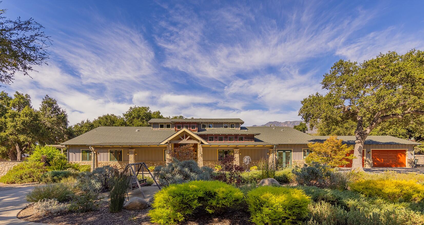 705 South Rice Road Ojai, CA 93023 - Photo 4 of 61 a front view of a house with a garden