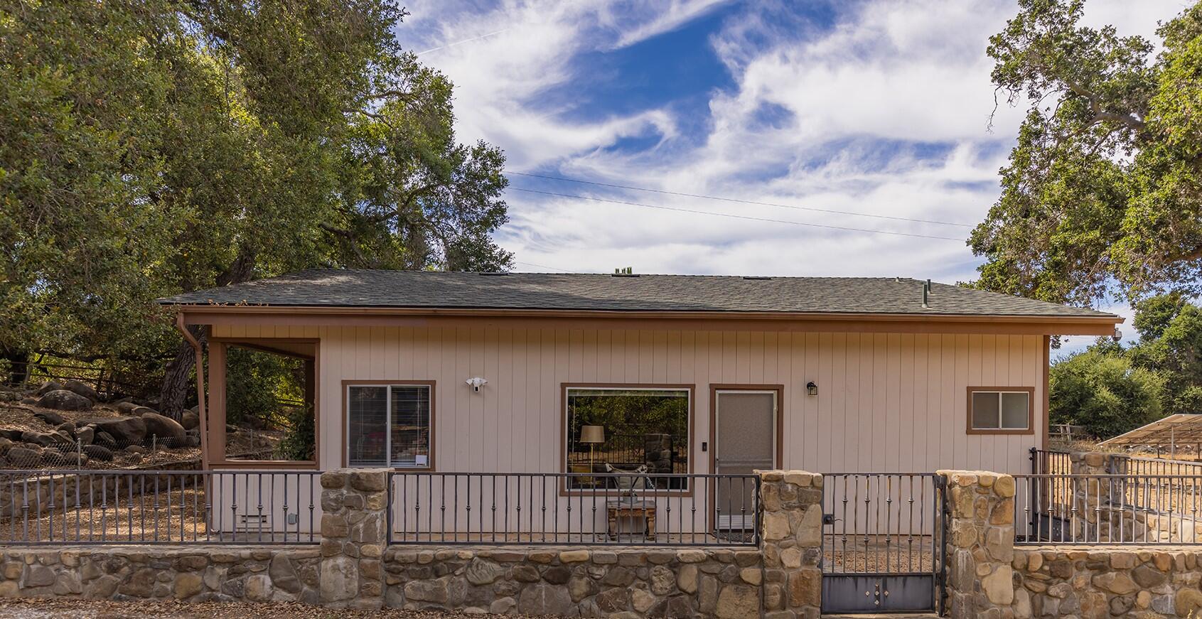 705 South Rice Road Ojai, CA 93023 - Photo 45 of 61 front view of a house with a bench