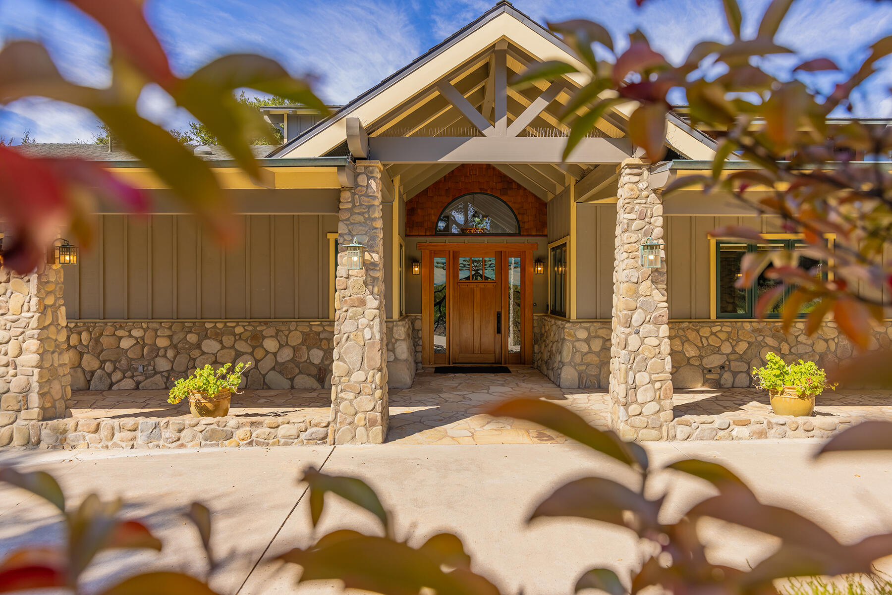 705 South Rice Road Ojai, CA 93023 - Photo 6 of 61 a view of a brick house with large windows