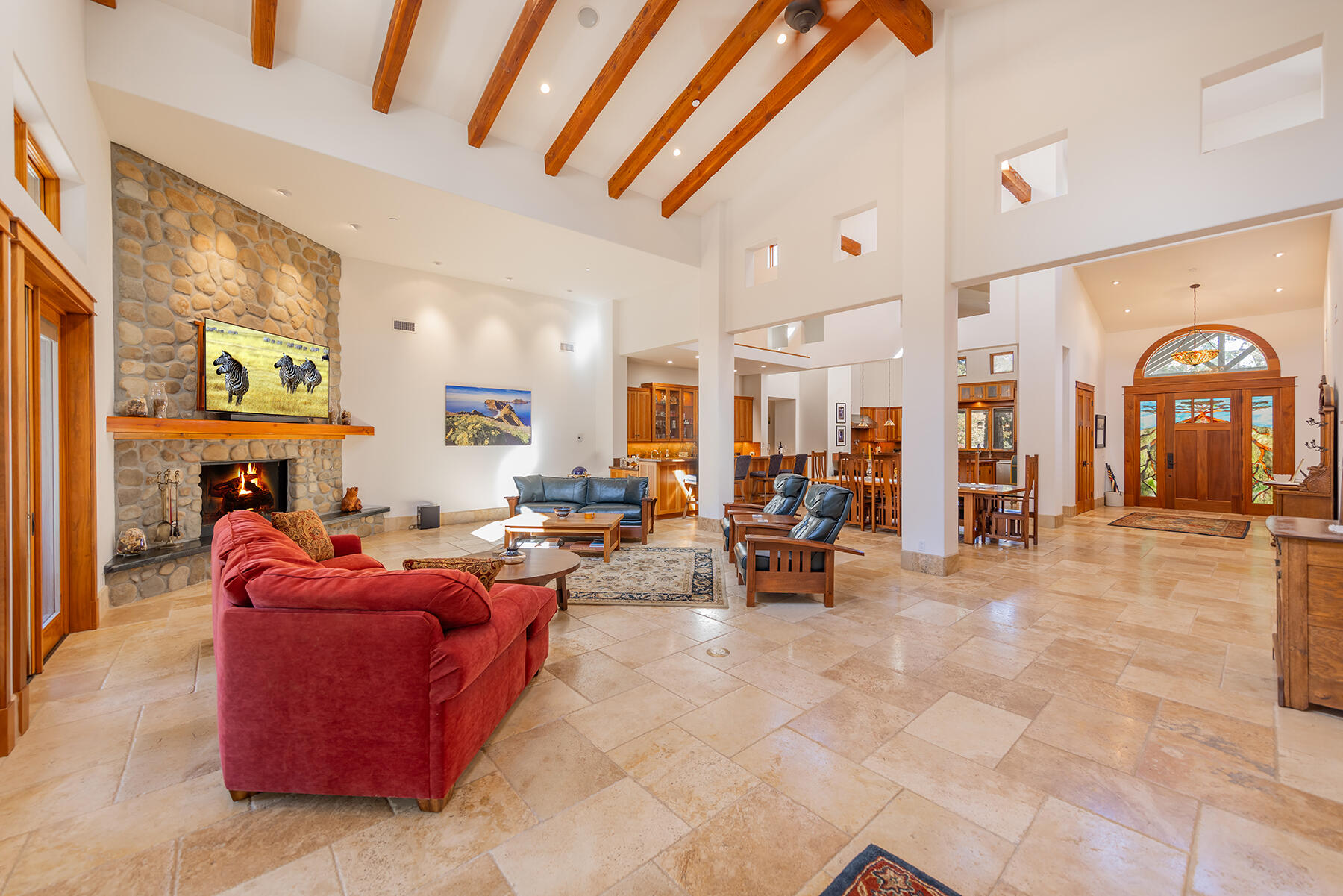 705 South Rice Road Ojai, CA 93023 - Photo 8 of 61 a living room with fireplace furniture and a large window