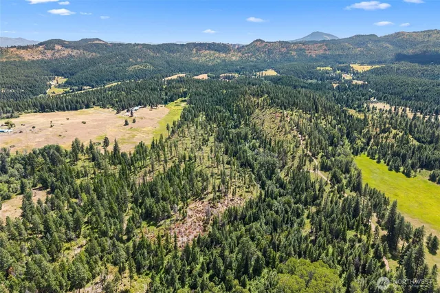 a view of mountain with lake view