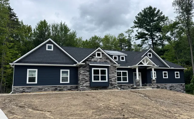 $730,000 | 5570 Golf Club Road, Howell, MI 48843