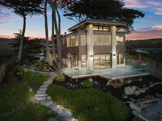 a bed room with a bed and a cabinets