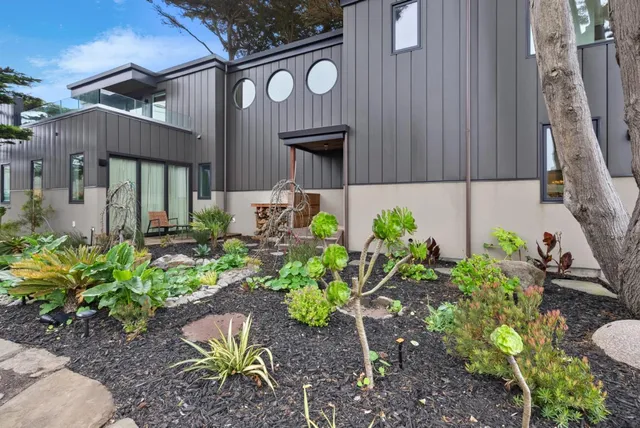 a view of outdoor space with yard and ocean view