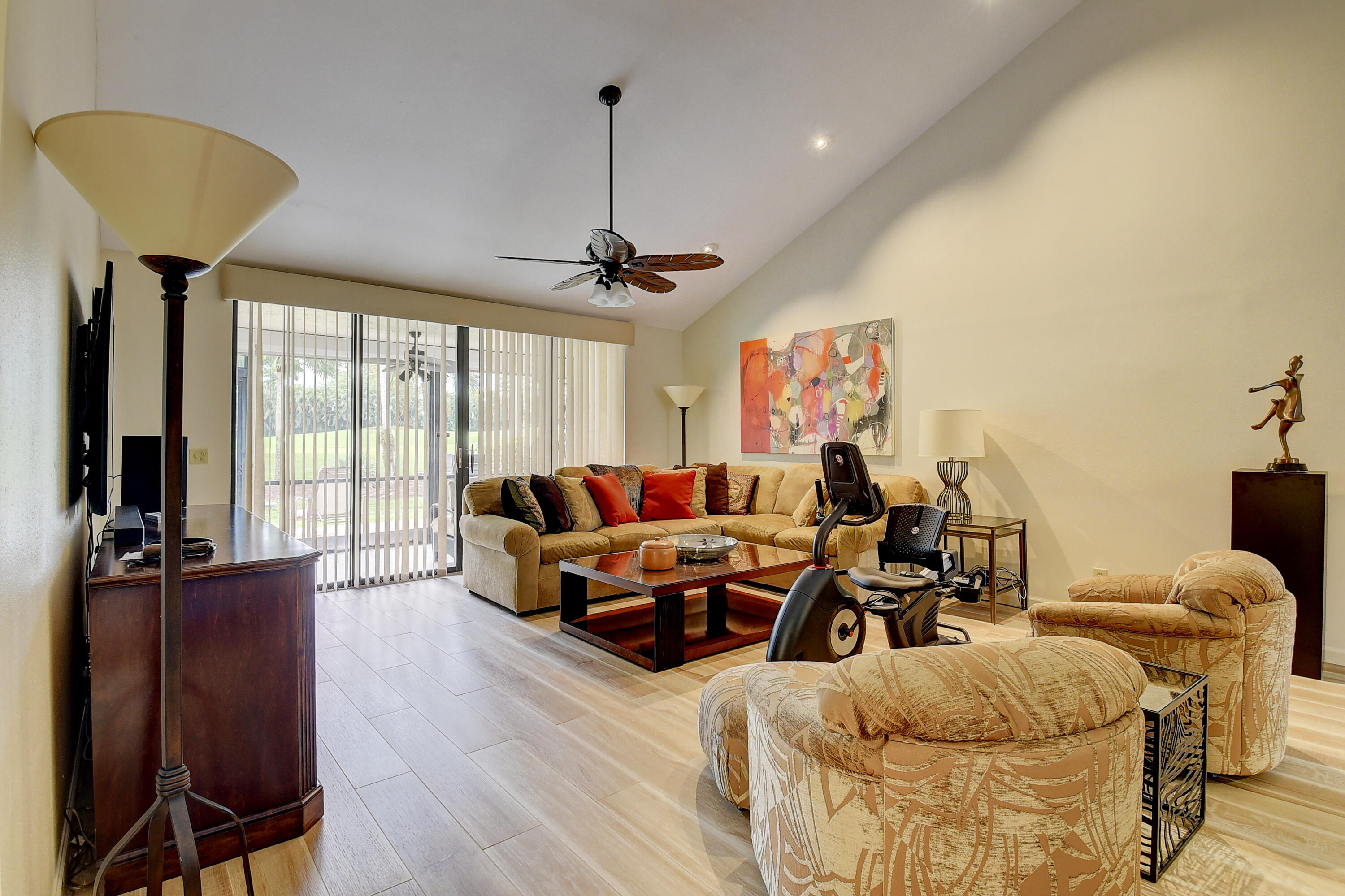 19550 Sawgrass Drive, Unit 2102 Boca Raton, FL 33434 - Photo 7 of 76 a living room with furniture and a chandelier