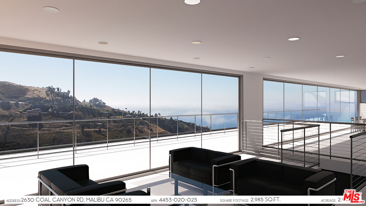 0 Coal Canyon Road Malibu, CA 90265 - Photo 5 of 21 a view of living room with furniture and floor to ceiling window