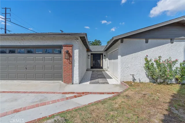 a view of a house with a garage