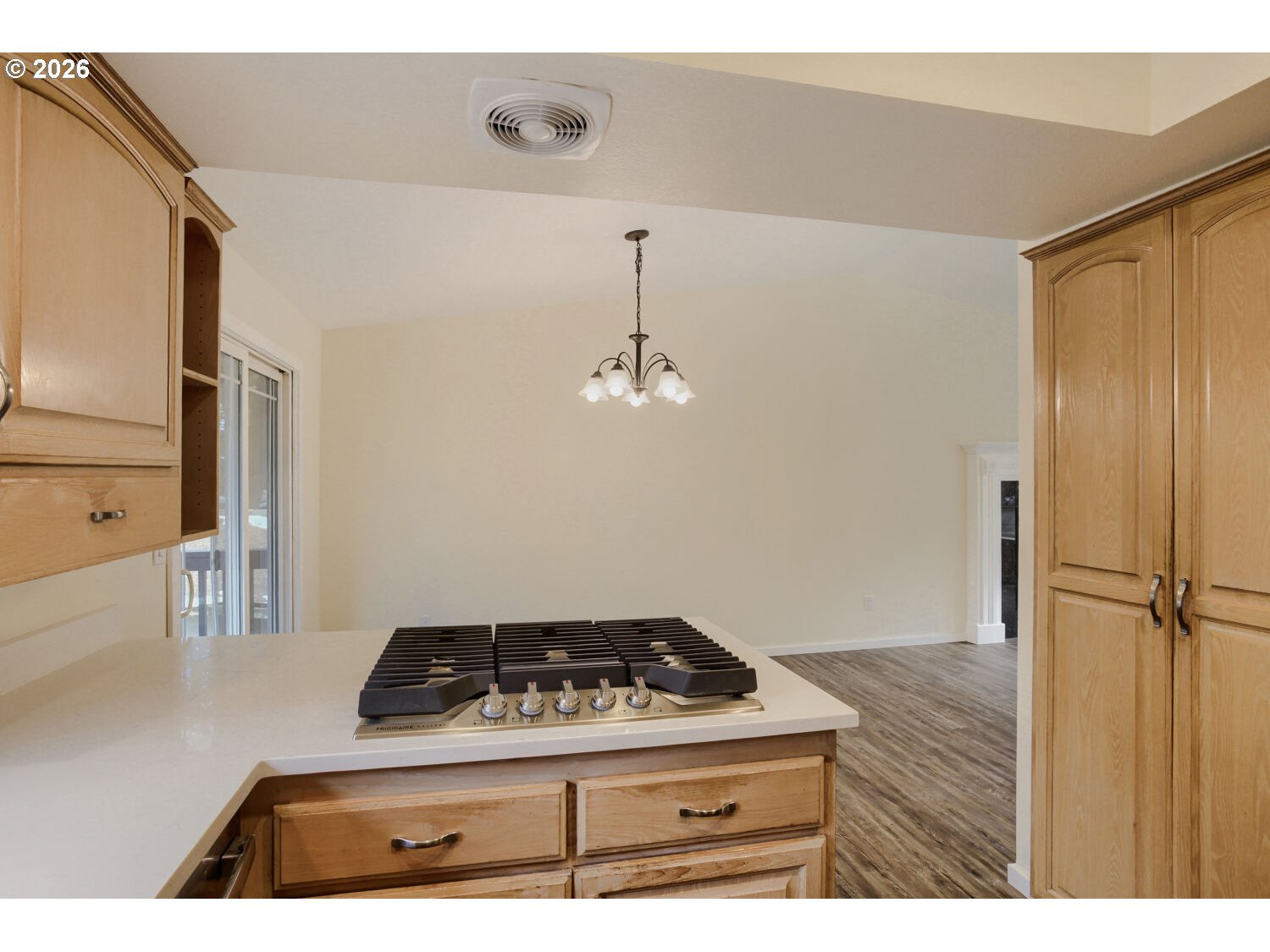 14539 Southeast Center Street Portland, OR 97236 - Photo 12 of 30 a kitchen with a stove and a refrigerator