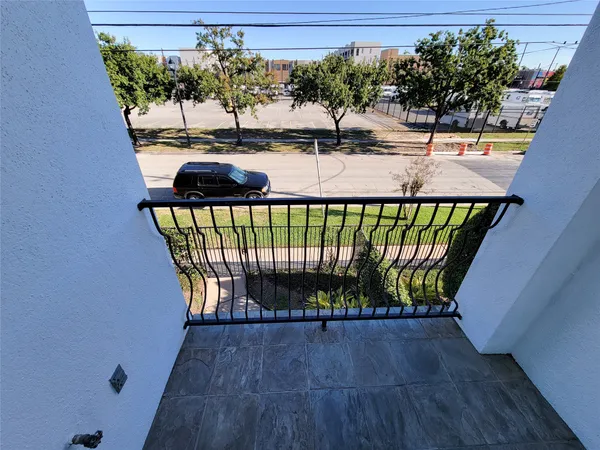 a view of a swimming pool with patio