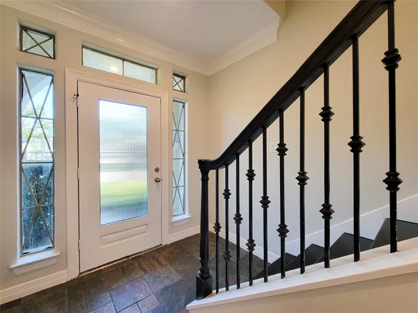 a view of an entryway with staircase
