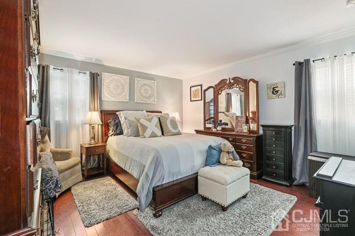 82 Brandywine Road Fords, NJ 08863 - Photo 14 of 26 a bedroom with a bed couch and a window