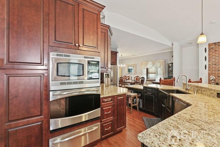 82 Brandywine Road Fords, NJ 08863 - Photo 3 of 26 a kitchen with stainless steel appliances granite countertop a refrigerator stove and sink
