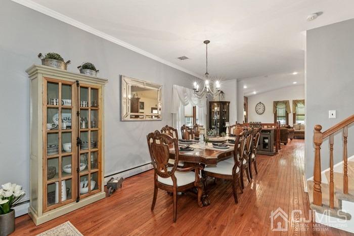 82 Brandywine Road Fords, NJ 08863 - Photo 8 of 26 a view of a dining room with furniture and wooden floor
