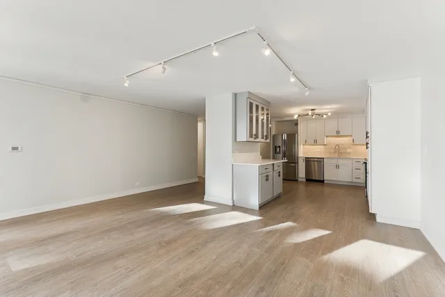 a view of a kitchen with a sink