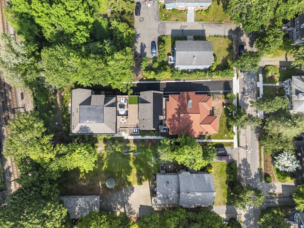 145 Warren Street, Unit 4 Newton, MA 02459 - Photo 30 of 35 an aerial view of a house with a garden