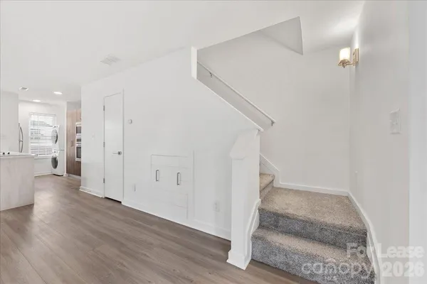a view of entryway with wooden floor