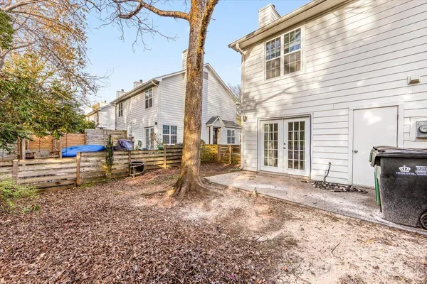 a house view with a backyard space