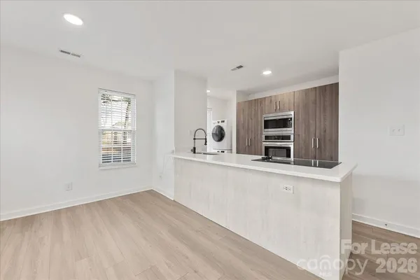 a view of a kitchen with electric equipment