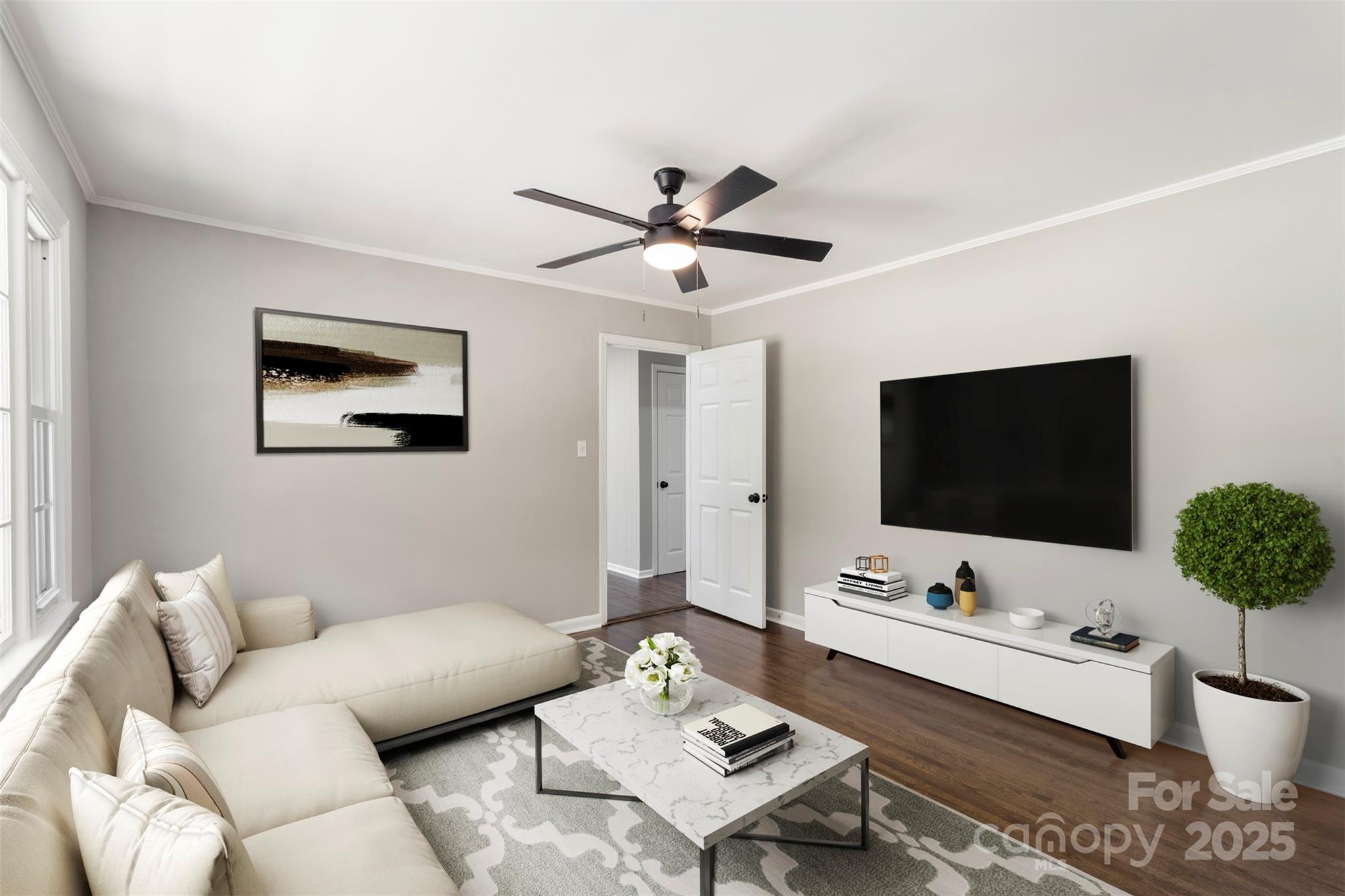 1428 Boxwood Avenue Lancaster, SC 29720 - Photo 11 of 44 a living room with furniture and a flat screen tv