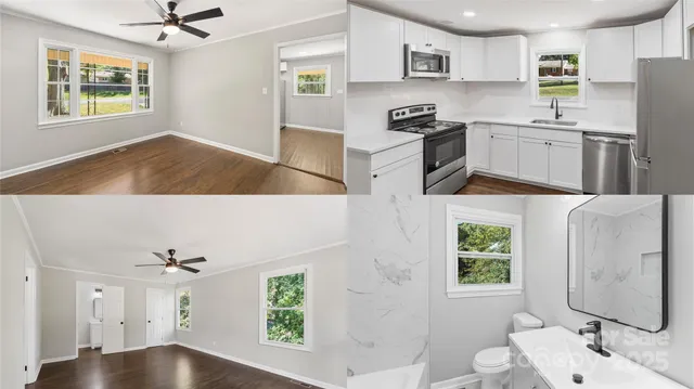 a kitchen with stainless steel appliances a stove a sink cabinets and a window