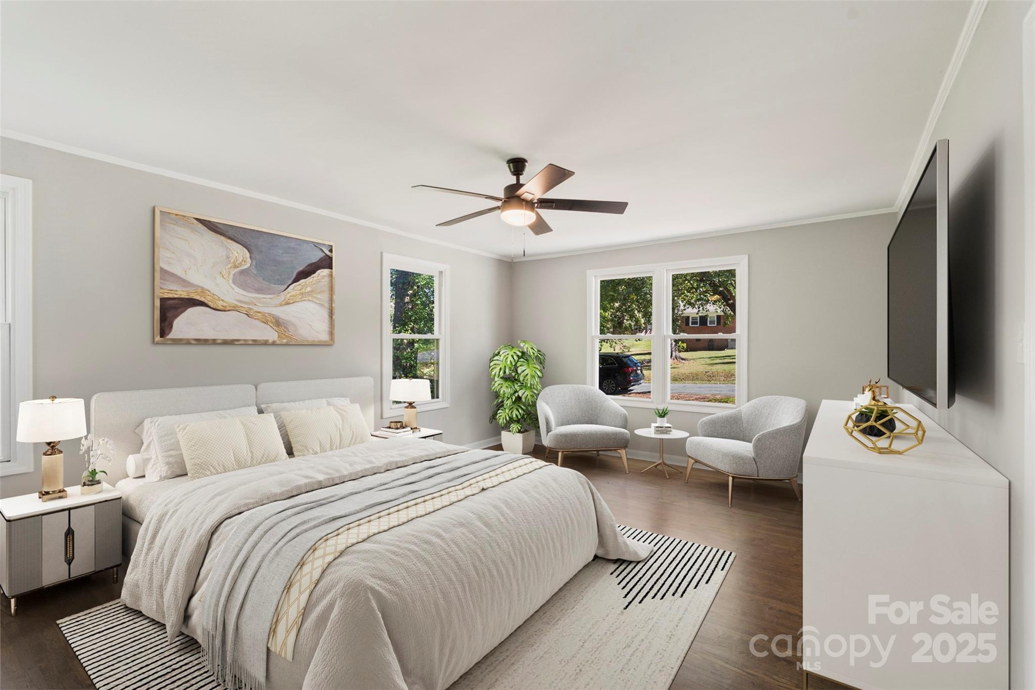 1428 Boxwood Avenue Lancaster, SC 29720 - Photo 22 of 44 a bedroom with a bed and a flat screen tv