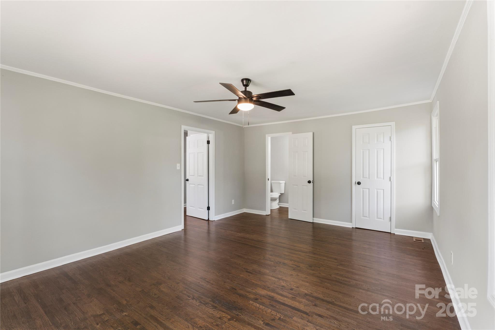 1428 Boxwood Avenue Lancaster, SC 29720 - Photo 25 of 44 a view of an empty room with wooden floor