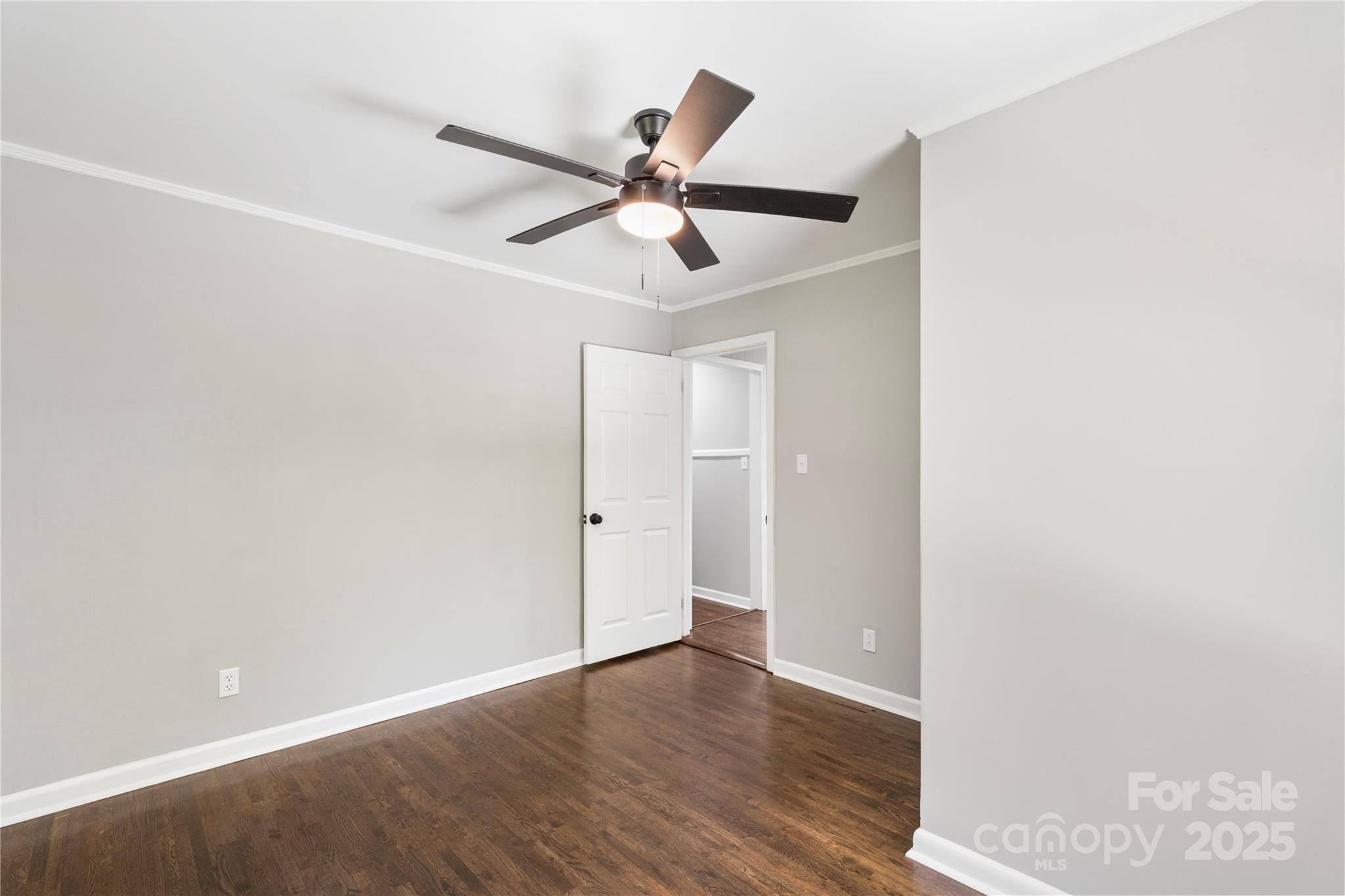 1428 Boxwood Avenue Lancaster, SC 29720 - Photo 32 of 44 a view of an empty room with wooden floor