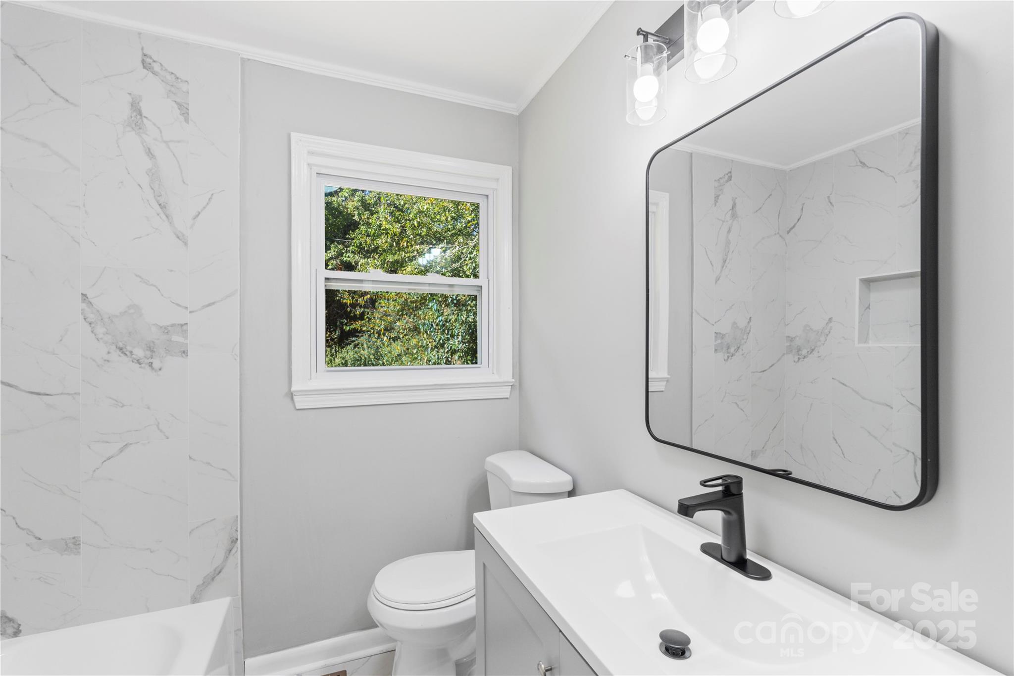 1428 Boxwood Avenue Lancaster, SC 29720 - Photo 33 of 44 a bathroom with a sink toilet and shower