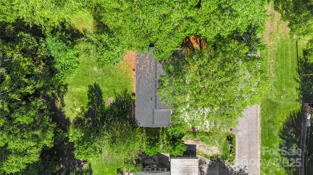 an aerial view of residential house with outdoor space