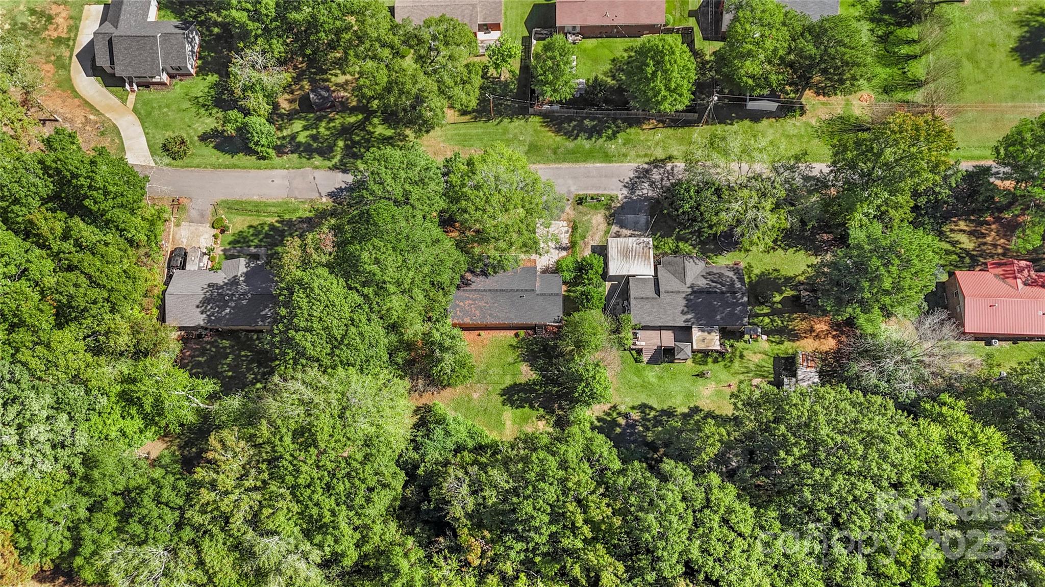 1428 Boxwood Avenue Lancaster, SC 29720 - Photo 42 of 44 an aerial view of residential house with outdoor space and trees all around