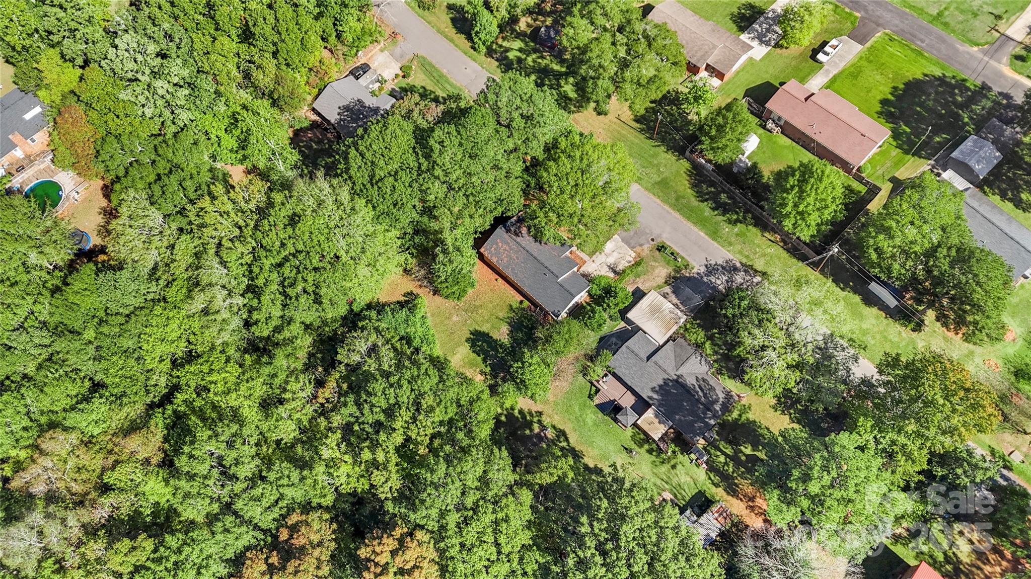 1428 Boxwood Avenue Lancaster, SC 29720 - Photo 44 of 44 an aerial view of residential house with outdoor space and trees all around