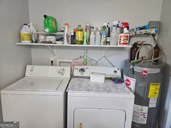 a bedroom with a bed wooden floor and a window