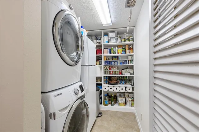 a view of a storage & utility room with washer and dryer