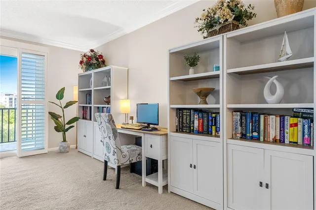 a workspace with furniture and book shelf