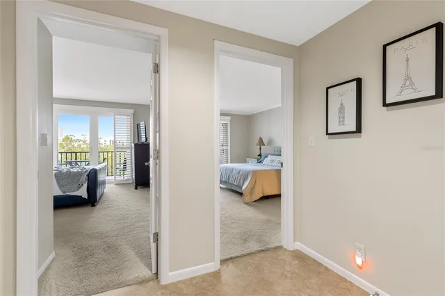 a view of a bedroom with a bed and couch