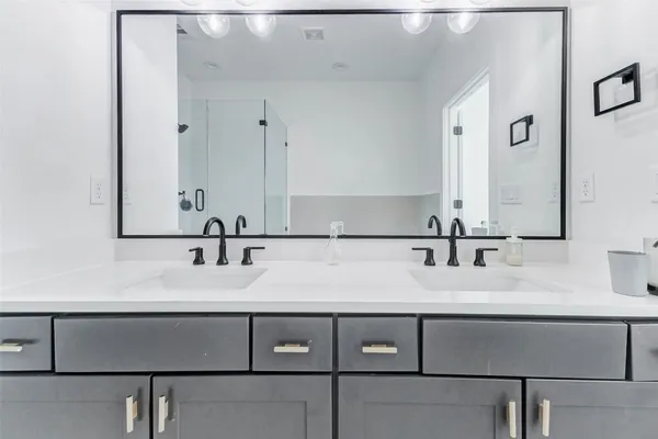 a white tub sitting in a bathroom